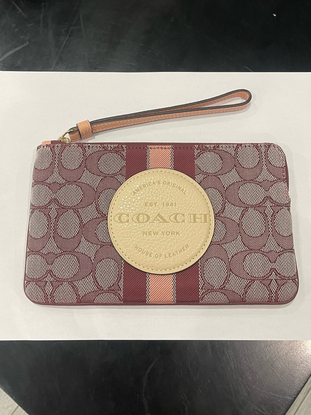 Coach Maroon Signature Wristlet with Tan Logo Patch and Strap